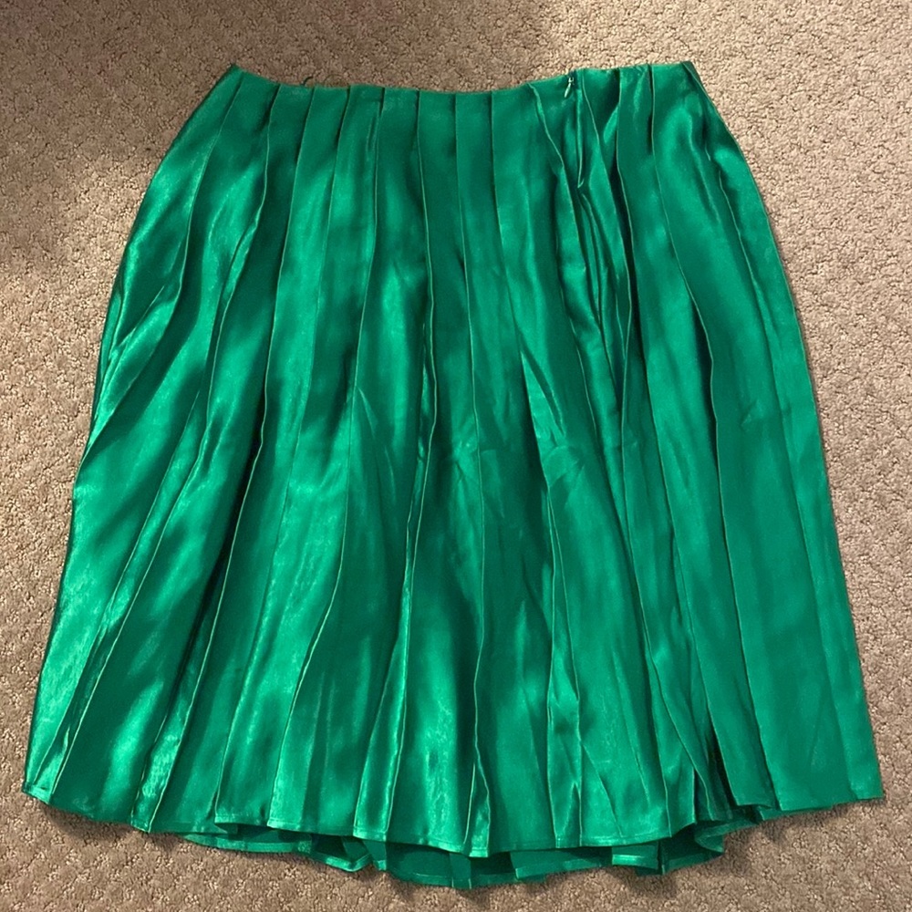 Green shiny pleated skirt